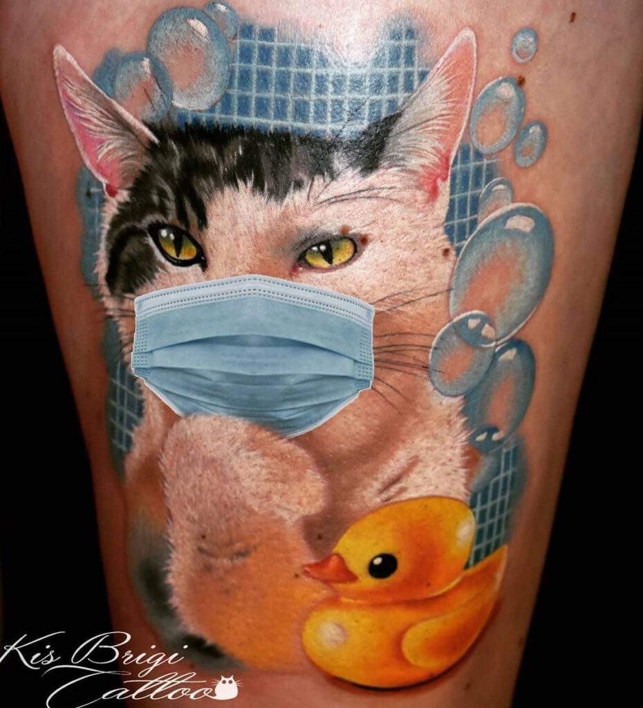 Tattoo Anansi München Artist Brigi realism portrait color cat Katze mask rubber duckTattoo Anansi München Artist Brigi realism portrait color cat Katze mask rubber duck